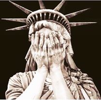 statue of liberty covering face with hands