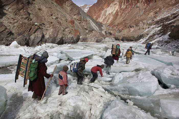 Kids Traveling To A Boarding School Through The Himalayas, Zanskar, Indian Himalayas; photo by Timonthy Allen