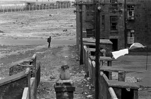Nick Hedges, "Make life worth living," photographs for Shelter; tenements and wasteland near Red Road flats, 1971