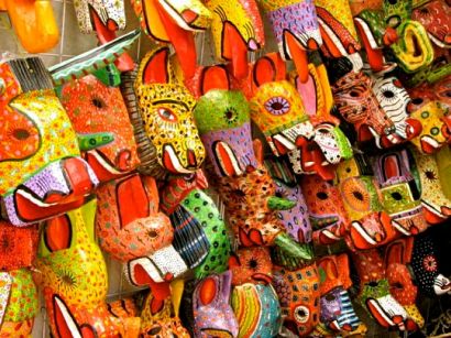 Mask-maker's booth, San Cristóbal de las Casas, mercado at Templo Santo Domingo, photo by Jim Cook