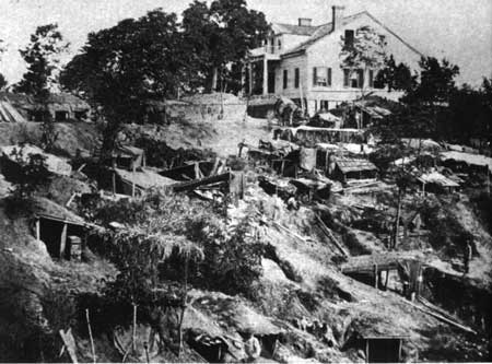 The Shirley House and the encampment of the Fifth Illinois during the siege of Vicksburg, reproduction of a wartime photograph