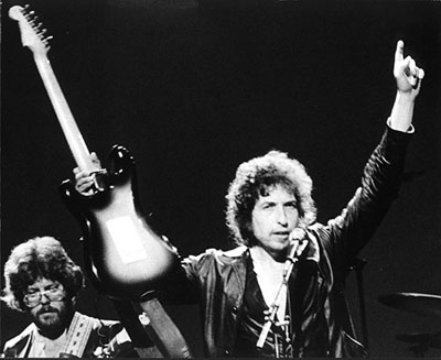 Bob Dylan, guitar and arms in the air (Palace Theater, Albany, NY, 1980)