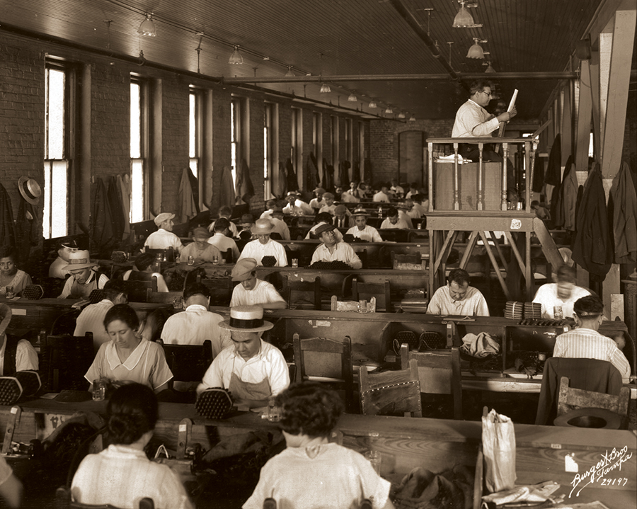 A lector reads to cigar makers at Cuesta Rey and Company Cigar Factory, 1929