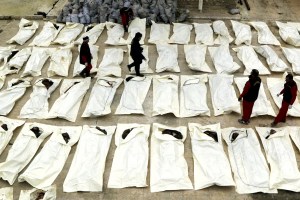Aleppo, Workers document and count dead bodies, Mahmoud Hebbo - Reuters