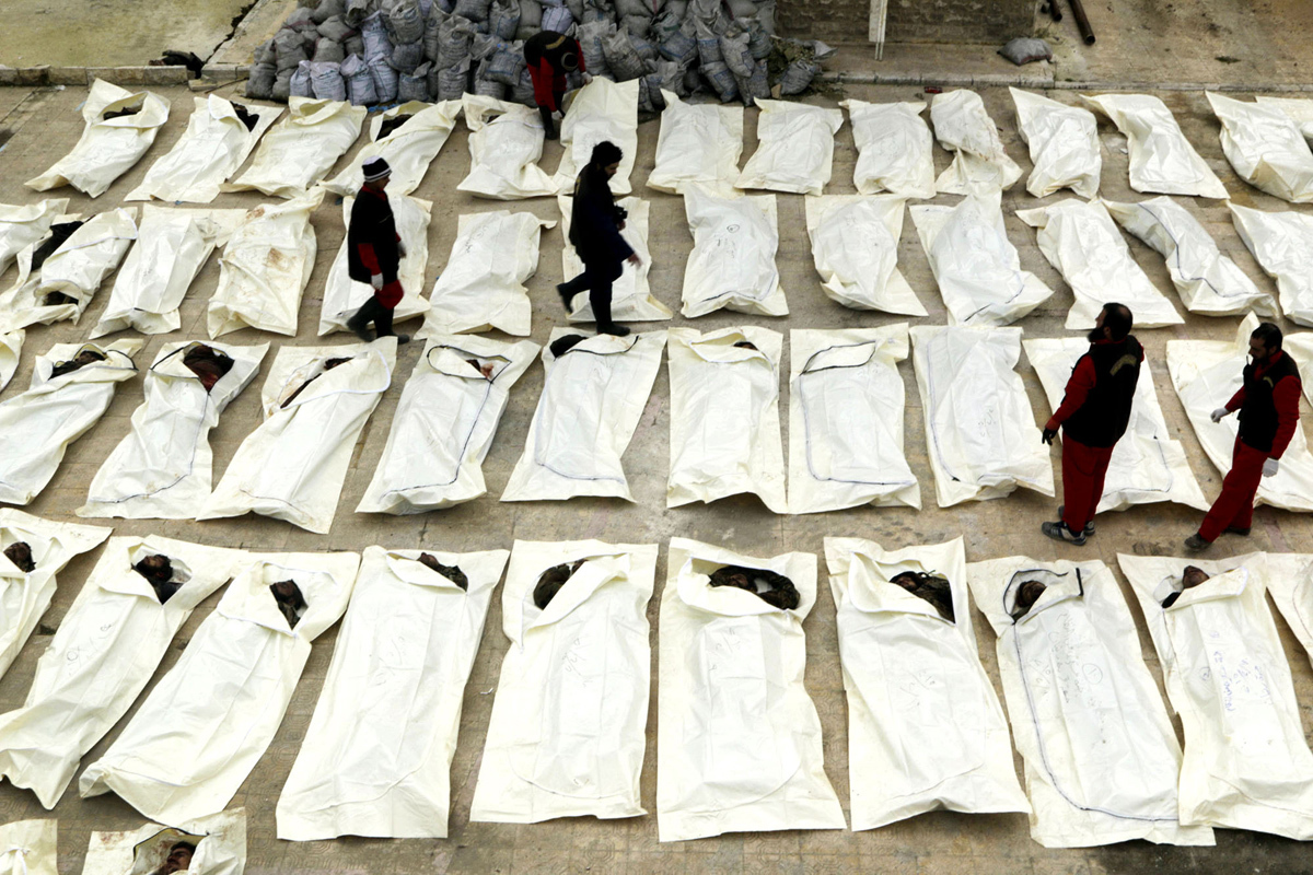 Aleppo, Workers document and count dead bodies, Mahmoud Hebbo - Reuters